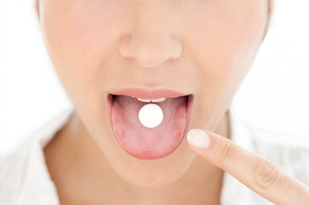 When Are Alpha-Blockers Prescribed Woman drinks alpha-blockers